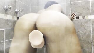 Latina with a massive ass and a vibrator get naughty in a sensual shower