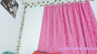 Latina's feet are worshipped while she dominates with total poise