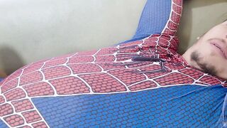 Stepmom and stepdaughter in Spiderman costume get down and dirty in a steamy threesome