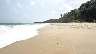 Watch Pink Pussy and her Colombian Latina friend get naughty on a public nude beach while strangers watch! - 1 image