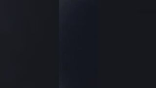 Bisexual threesome with brunette using strapon to fuck with interracial male duo - 1 image