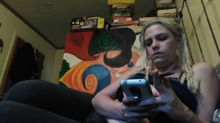 Hot blonde smokes clove cigarettes, plays on phone and plays with tits - 9 image