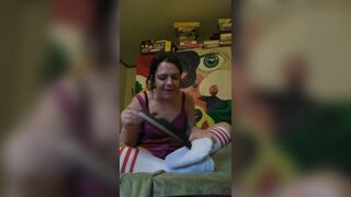 Tickles feet in tube socks with feather - 2 image