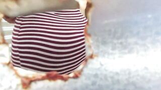 Caught through a hole in the dressing room in public