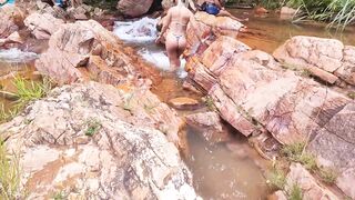 Outdoor adventure on the waterfall trail fucking and cumming inside the hottie's ass until cum overflows. Vagninho and Luna Oliveira - 1 image