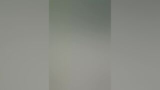 Gothic chick strokes a huge cock in the middle of the forest