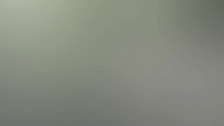 Gothic chick strokes a huge cock in the middle of the forest