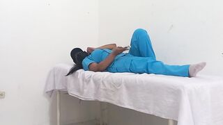 Naughty nurse rubs her tight pussy and moans with pleasure in her office